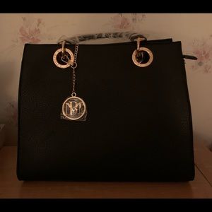 Brand new with tags black and gold Badgley Mischka.